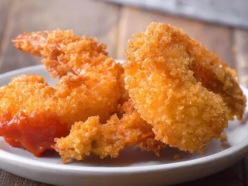 Crispy fried jumbo shrimp with sauce at Blue Ocean Basket, a Fast-Food Restaurant in Hamden